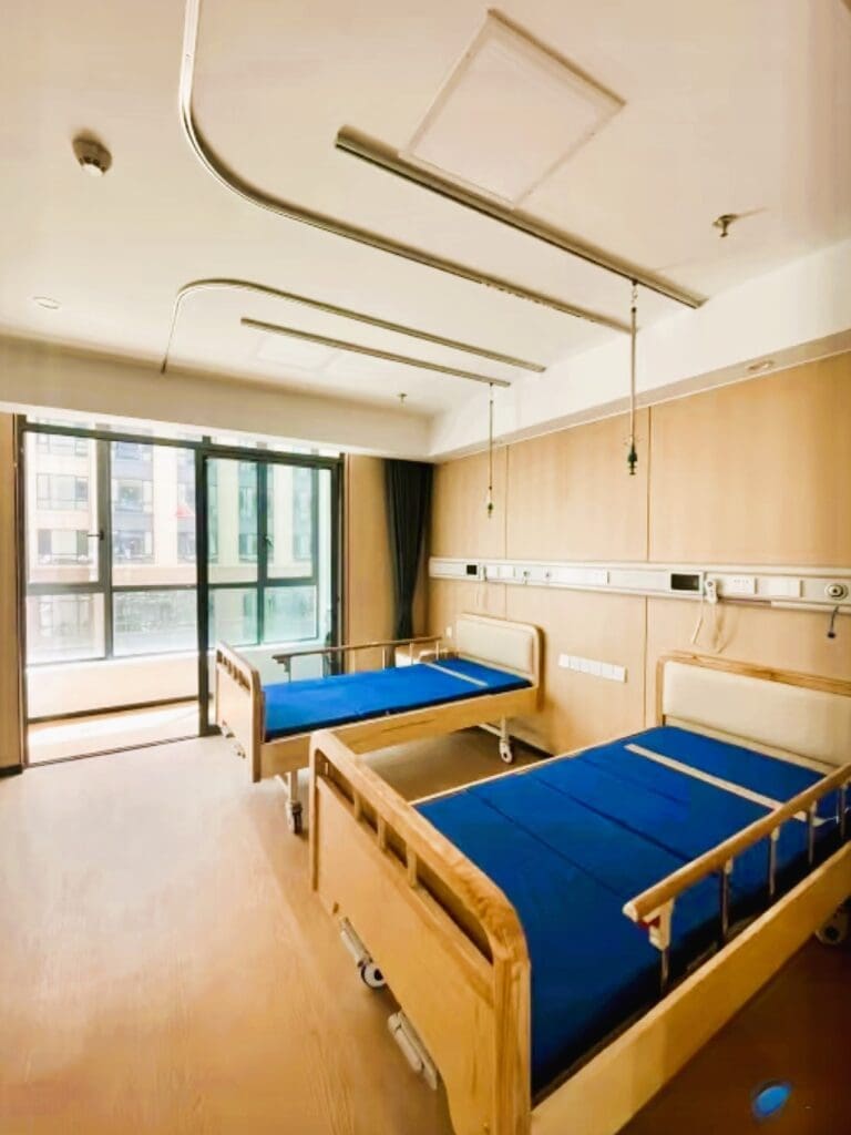 Hospital room with two empty beds.