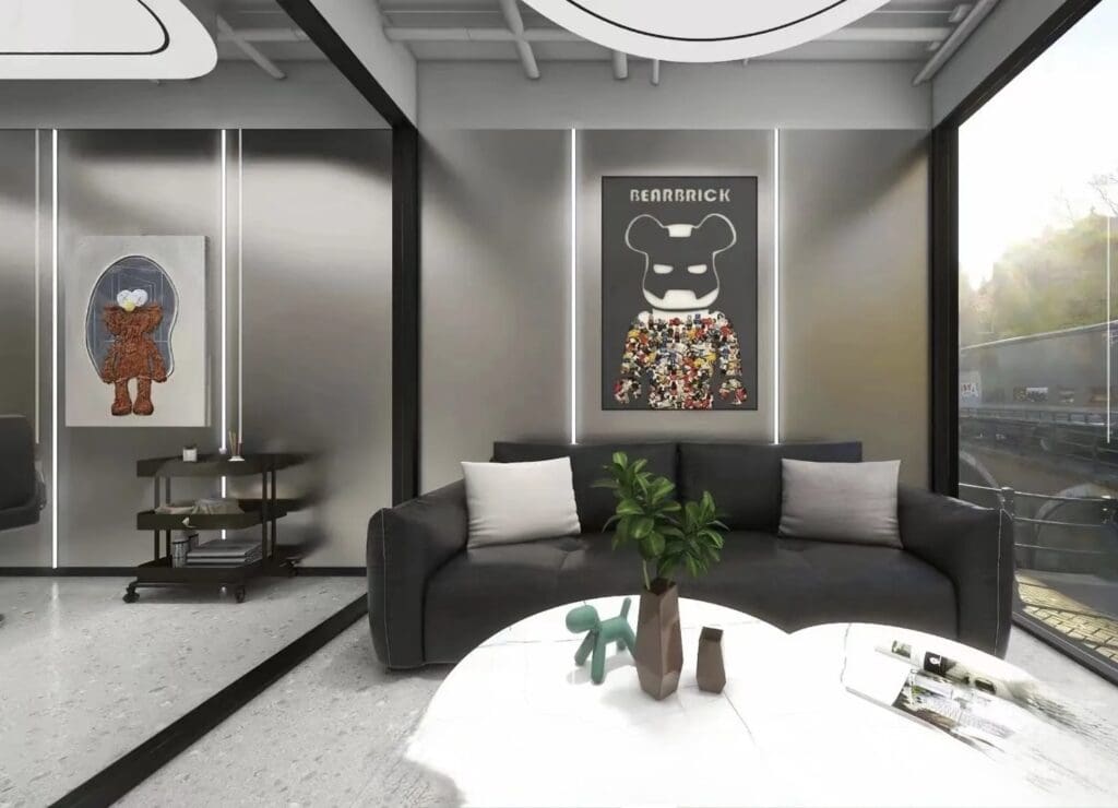 Modern room with art and black sofa.