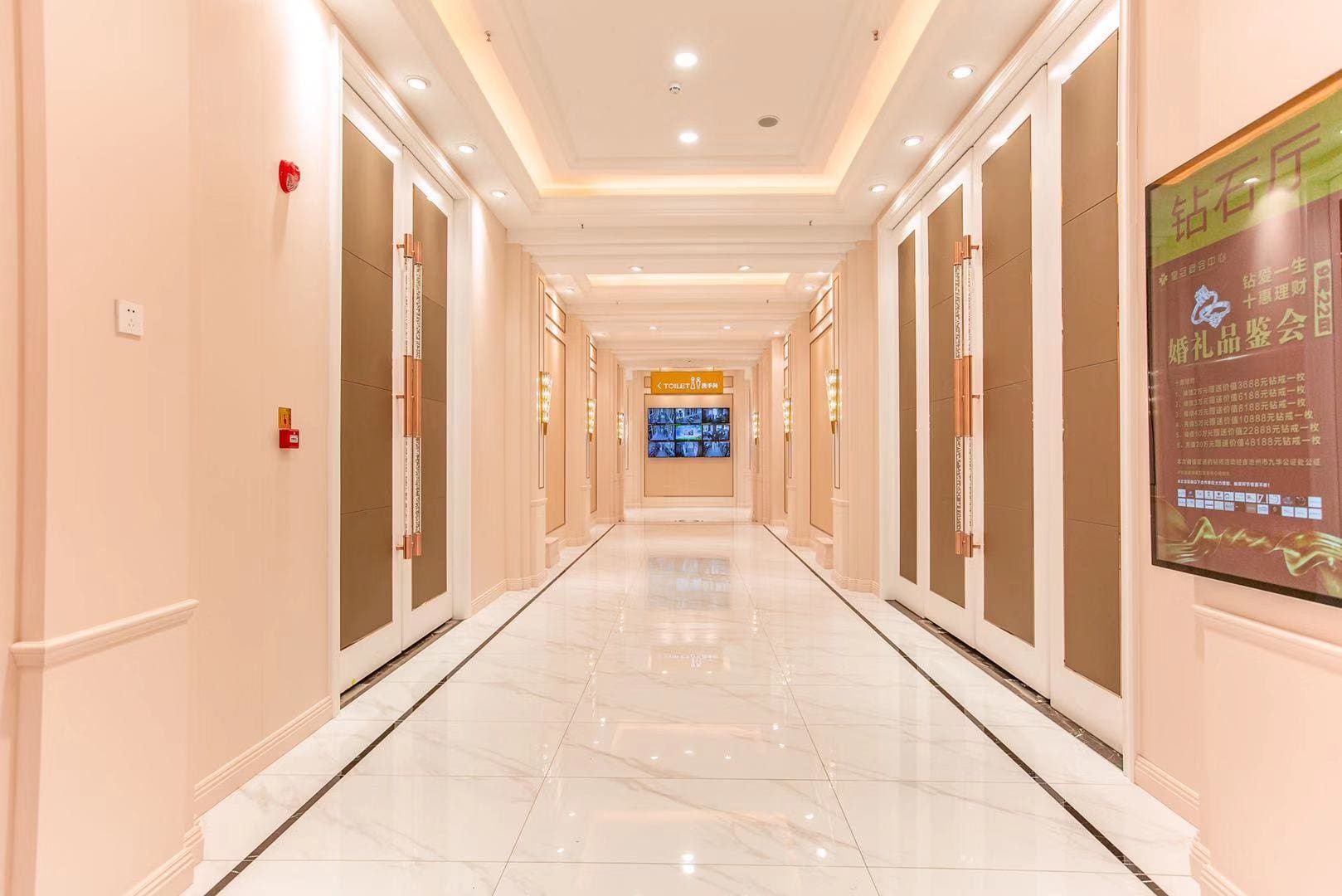Bright, elegant hallway with illuminated ceiling.